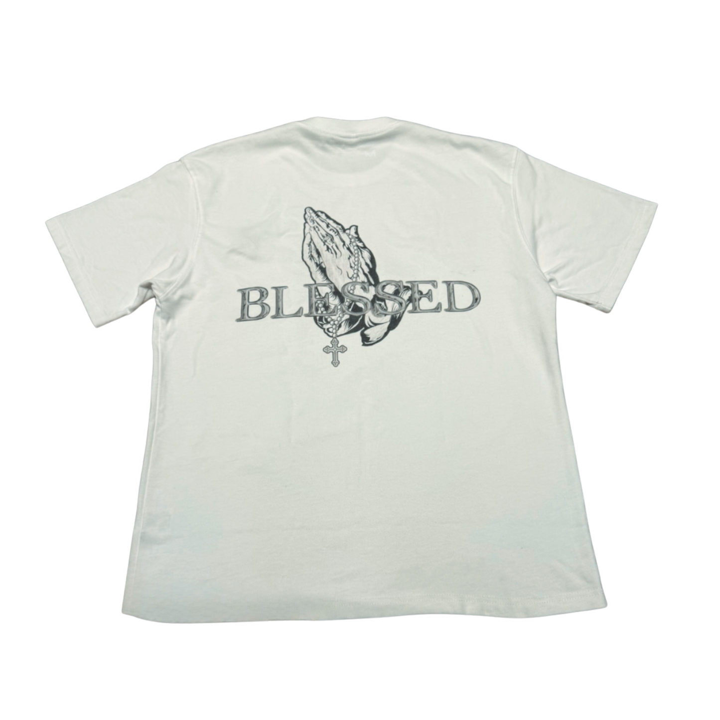 White t-shirt with 'Blessed' text and graphic design